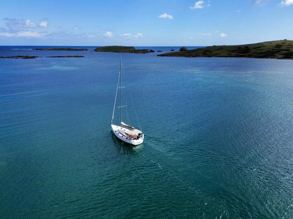 Boat floating on the ocean from the harbor
